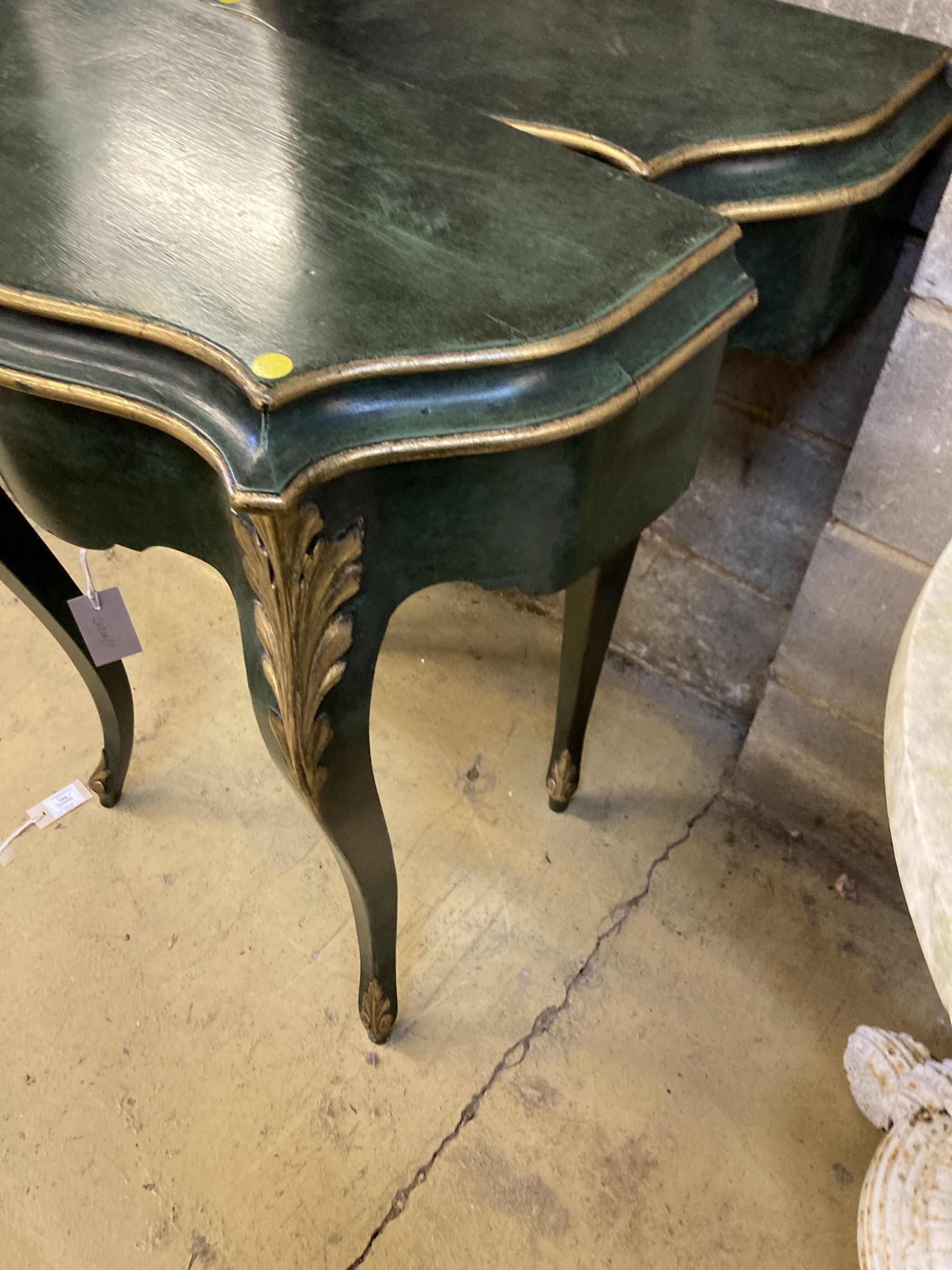 A pair of green painted and gilt console tables, width 65cm, depth 35cm, height 81cm